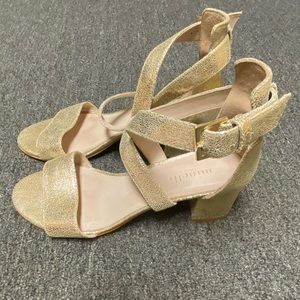 Golden heels with buckles